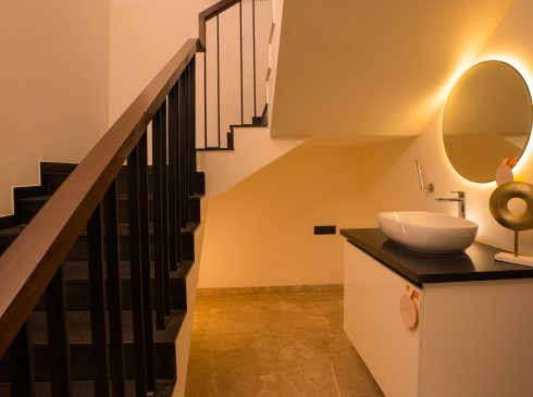 Caasagrand staircase and powder room view